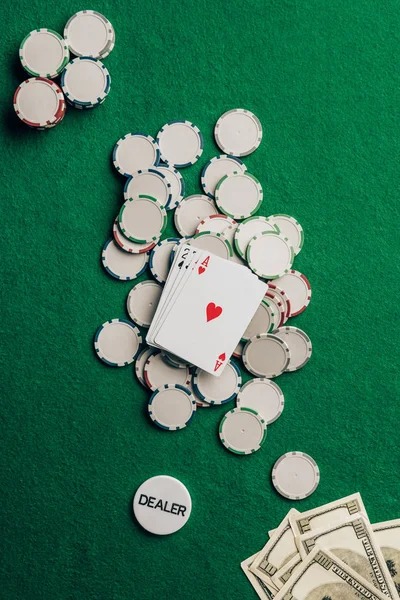 kudajitu slot app dashboard showing slot tournaments, live-dealer tables, and account menu